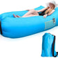 Inflatable lounger sofa in use at a campsite