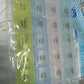 Transparent 7-day pill storage box with 4 rows for easy medication management.