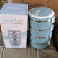 Stainless steel lunch box with four layers for hot food.