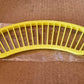 Banana slicer with handle for safe and efficient cutting.
