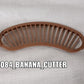 Handy plastic banana cutter with comfortable handle.