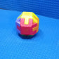 Activity cube with vibrant colors for children.