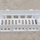 Plastic shower corner caddy with wall suction cup